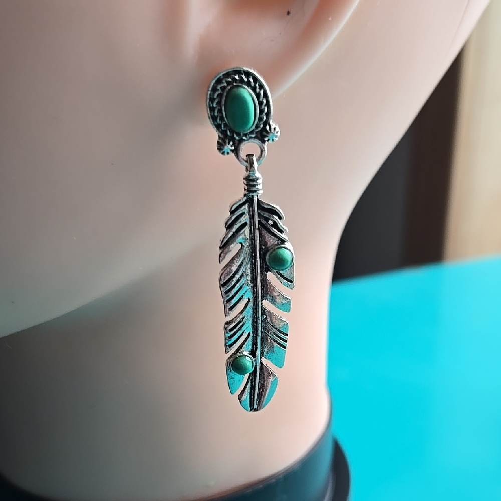 Silver Feather Earrings with Green Accents
